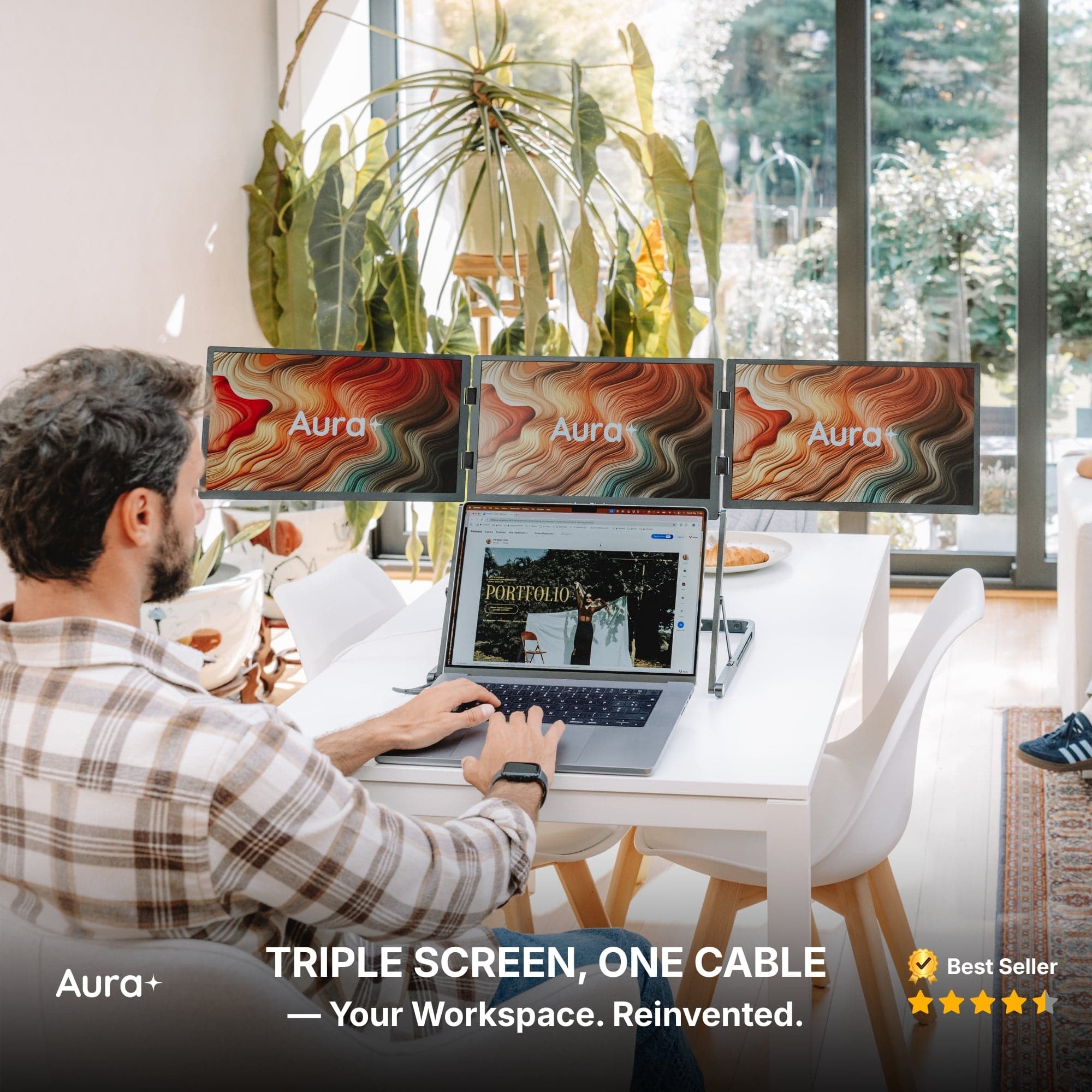 Aura Triple Aero Pro Max showing its three folding displays
