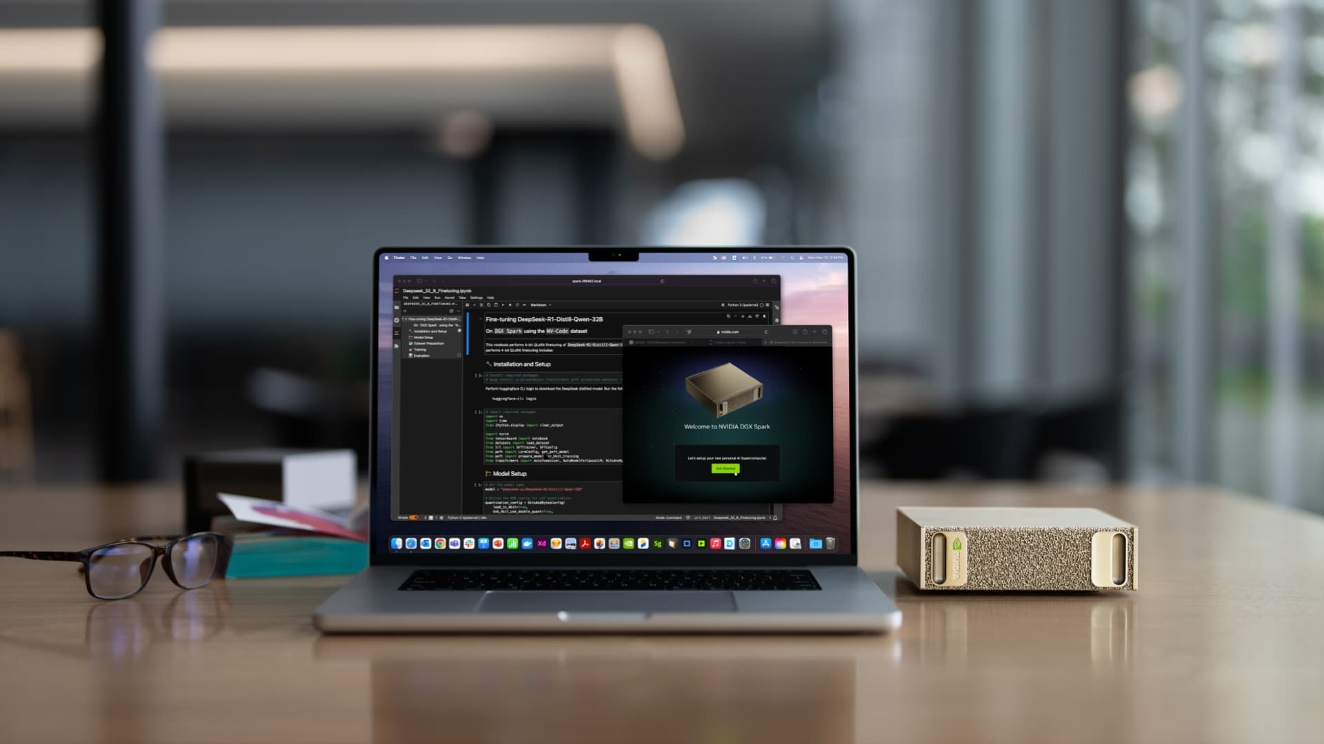 NVIDIA DGX Spark on a desk beside a laptop, framed around the computer